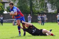 3. Owain Lord breaks a tackle.JPG